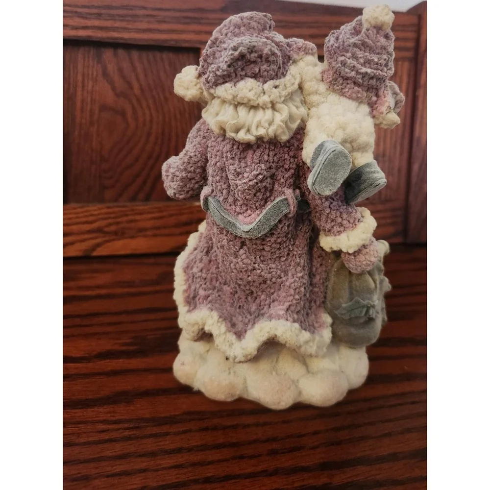 Vintage Velvet Touch Santa Claus with small‎ snow child holding a lantern.